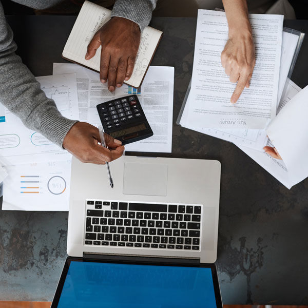 accountants with calculator